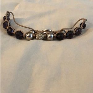 Purple and silver beaded bracelet